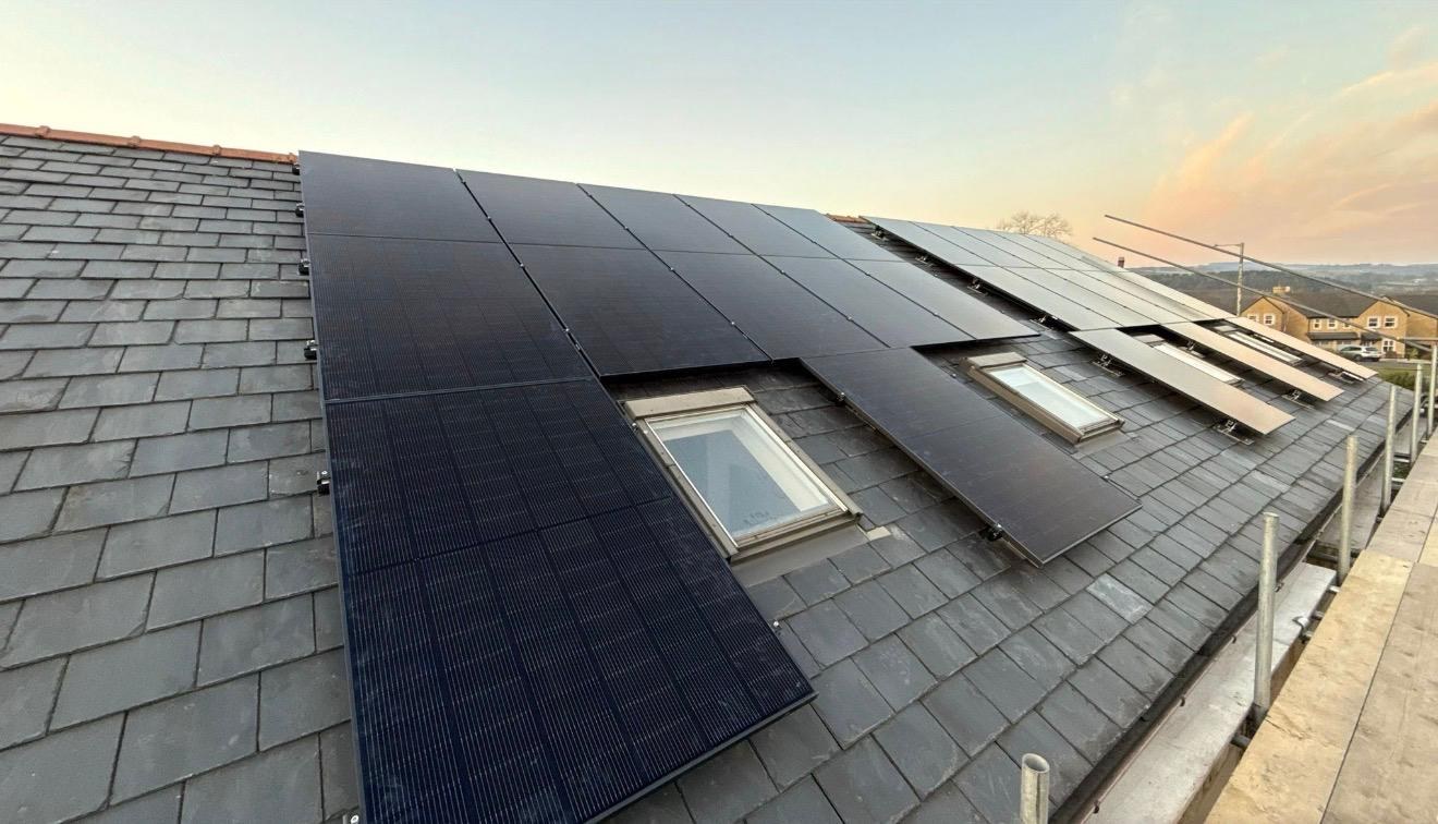 Rooftop solar PV installation on slate roof